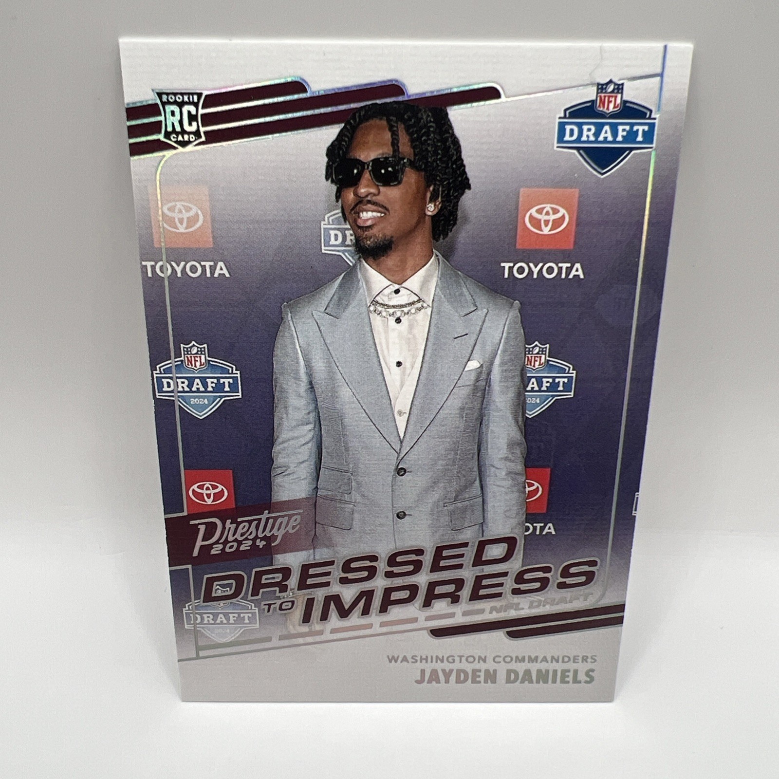 2024 Panini Prestige - Dressed to imPRESS Nfl Draft Jayden Daniels #DTI-3 (RC)