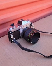 Nikon Nikkormat FT 35mm film camera with Vivitar 55mm F/2.8 MC Micro Lens