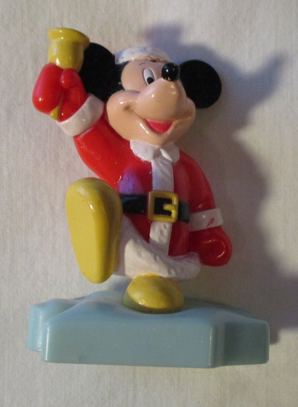 MM Dressed as Bell-Ringing Santa on puzzle piece
