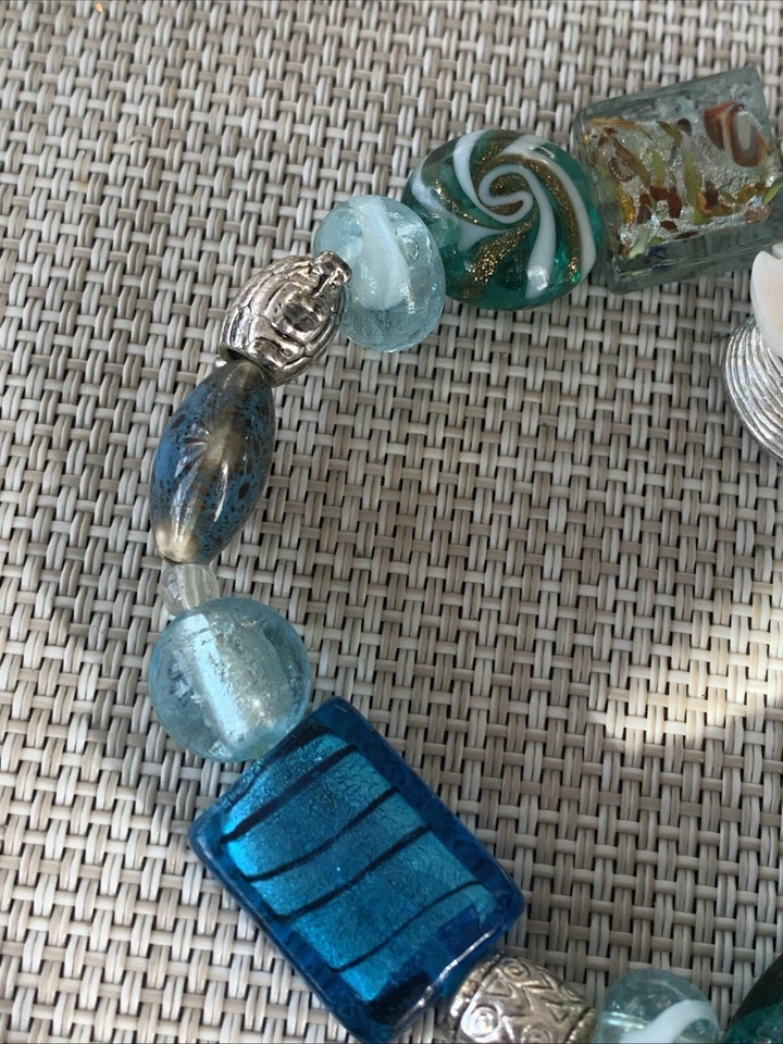Pulsera elástica vintage Avon Beachy azul vidrio veneciano cerámica tono plata Foto 3 de 4
