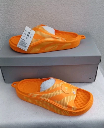 Nuove slide da donna Adidas x Stella McCartney ~ arancione ~ prezzo al pubblico consigliato $ 90 (IE3412) taglia 8