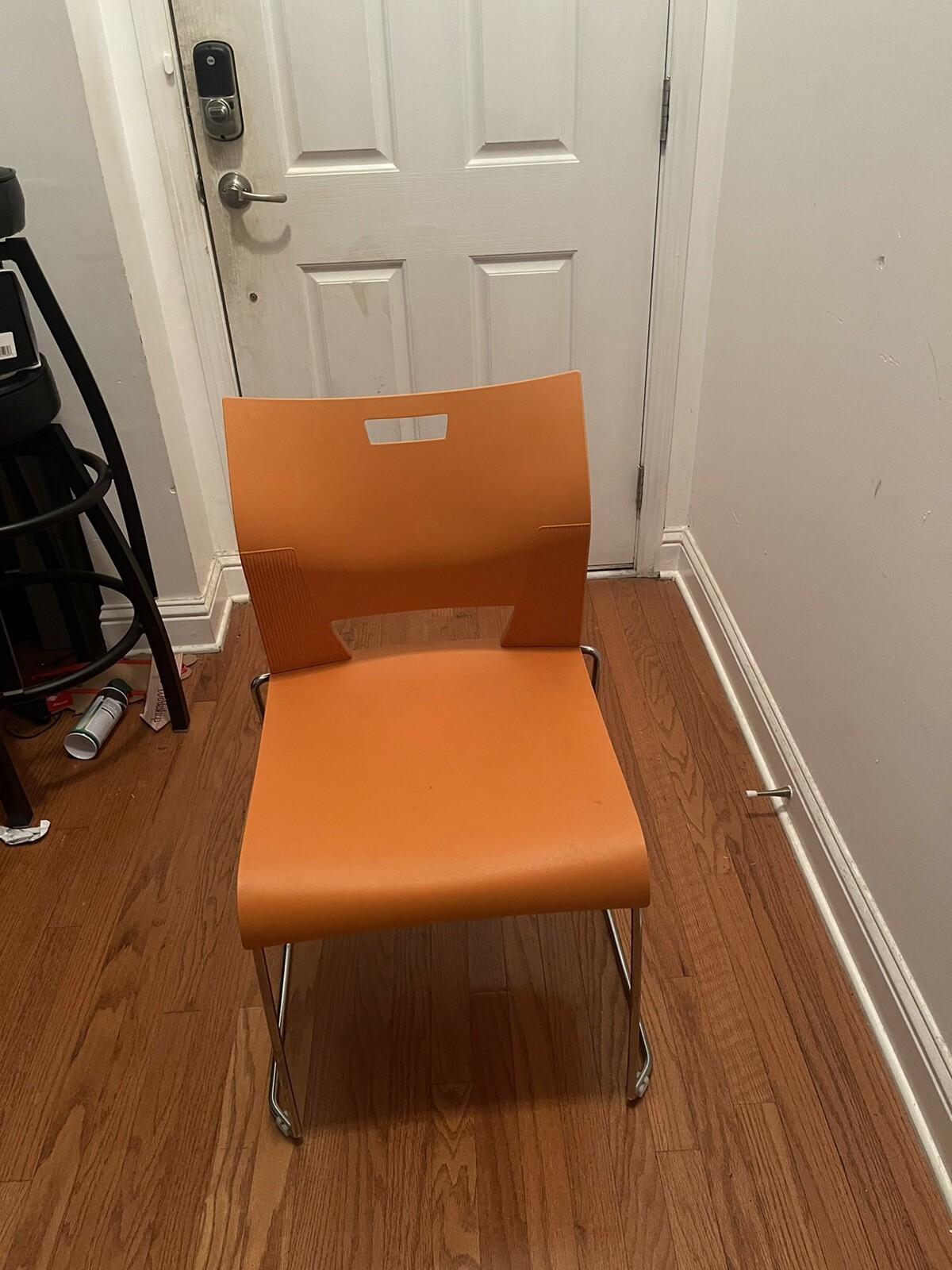 - Stackable Orange Plastic Chair