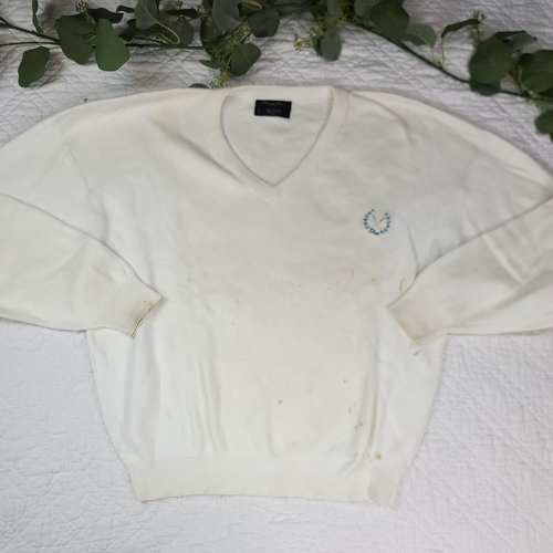 White VTG Christian Dior men’s V-neck sweater with blue monogram and laurel wreath logo on chest, made in USA.
