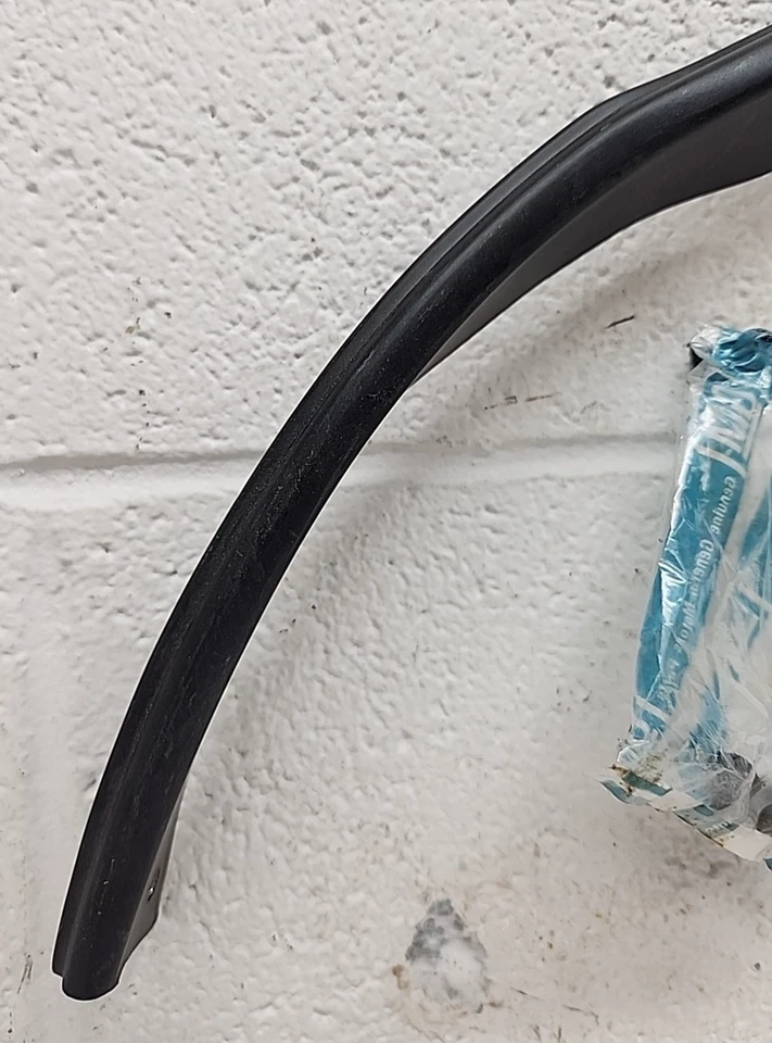 New OEM GM Rear LH Wheel Well Trim 20500892 1985-88 Oldsmobile Calais (SR14) - Image 3 of 4