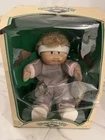 Cabbage Patch Kid Fuzzy Hair Original Outfit In Box has BLACK signature on bum