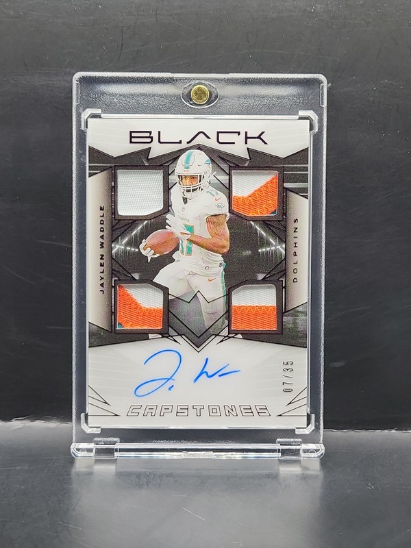 2024 PANINI BLACK CAPSTONES JAYLEN WADDLE #CAP-JWE QUAD PATCH AUTO #/35 Dolphins