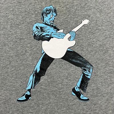 Seltenes hübsches grünes Jamie Hewlett Gorillaz Teenage Cancer Trust T-Shirt passt Small