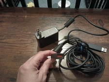 The power adapter is for the Xbox 360 Kinect sensor.  Model 1429