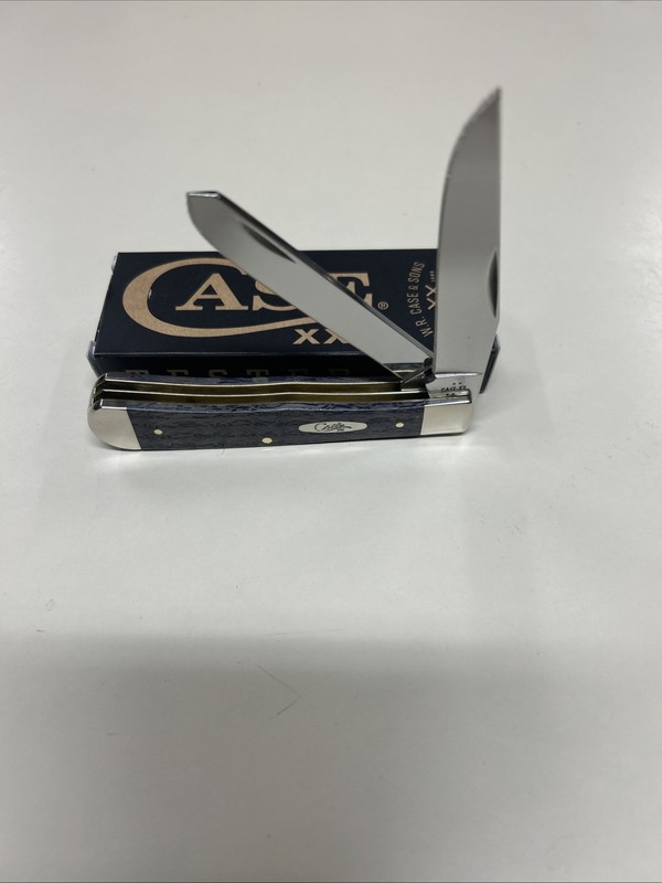 CASE XX # 47490 BLUE CURLY OAK WOOD SMOOTH TRAPPER SS