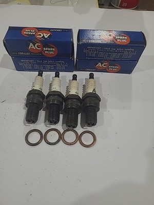 Vintage Set Of Four  AC 46XL Coralox Spark Plugs  New In Box. 
