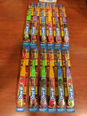 Box of 12 New Old Stock 2004 Oral B Stage 4 Toothbrushes PCN 666245 older child