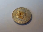 BENJAMIN   SILVER    HALF   DOLLAR    1952S     yellow     stain