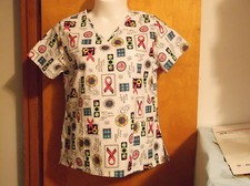 NEW LADY"S "SCRUB STAR" V' NECK WHITE w/ FLOWER PRINT SCRUB TOP...SIZE MEDIUM