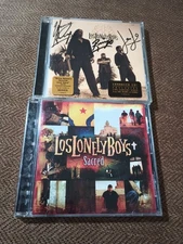 LOT of 2 - Los Lonely Boys Sacred CD & Los Lonely Boys Self Titled SIGNED CD