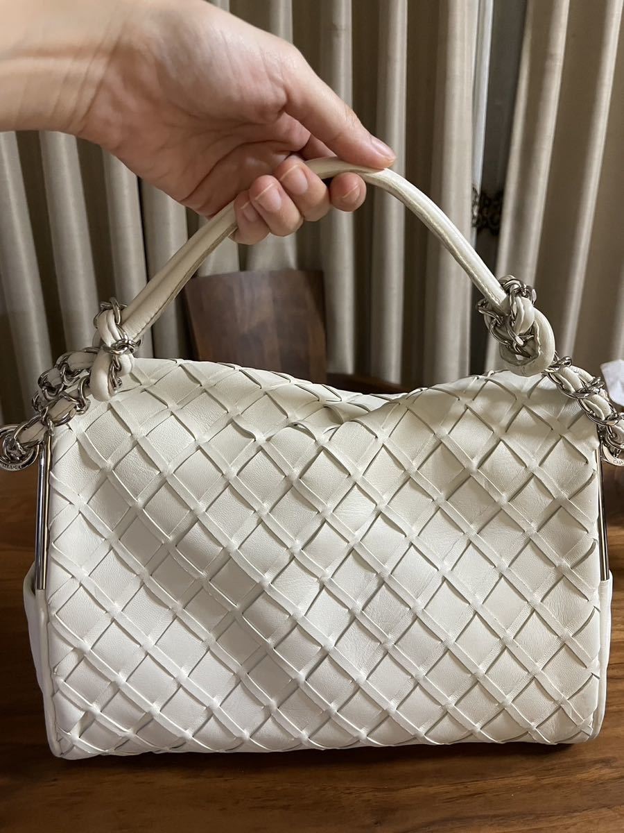 CHANEL Coco woven lambskin hand and shoulder bag