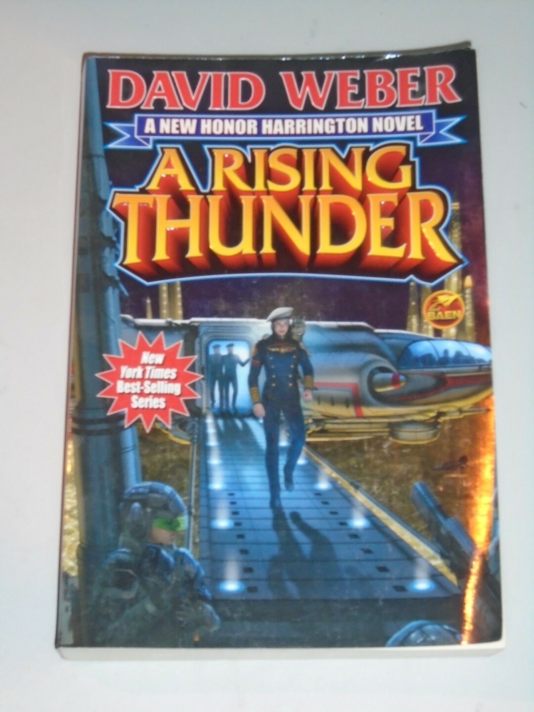 A Rising Thunder Baen David Weber $15.00 CVR (Paperback)< 9781451638714