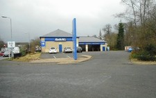 Photo 6x4 Kwik Fit, Milngavie Centre in Milngavie for Tyres, MOT and Serv c2018