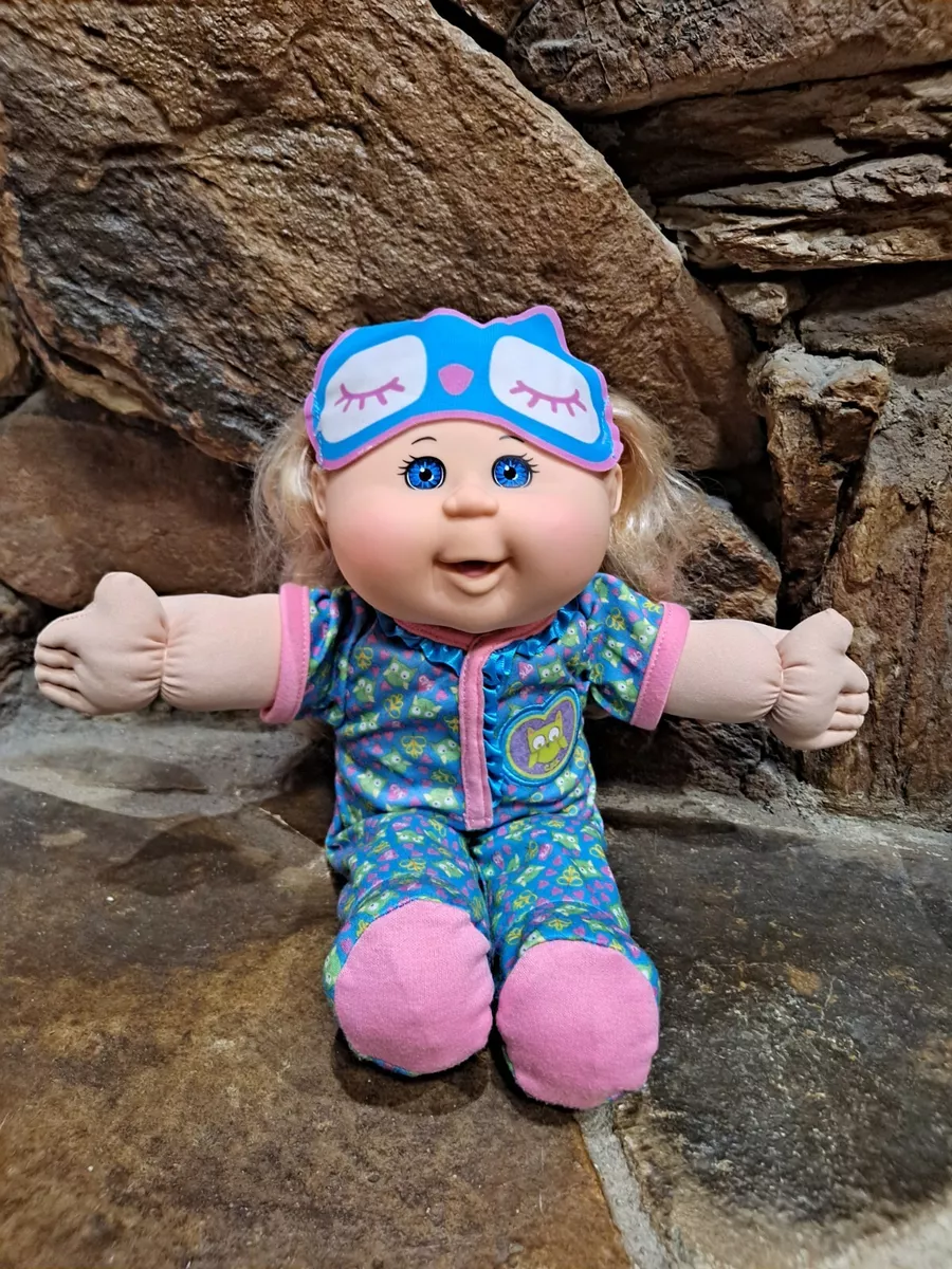 Cabbage patch kids toddler girl with blonde hair and store blue pajamas