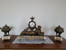 Horloge et cassolettes Ferville Suan