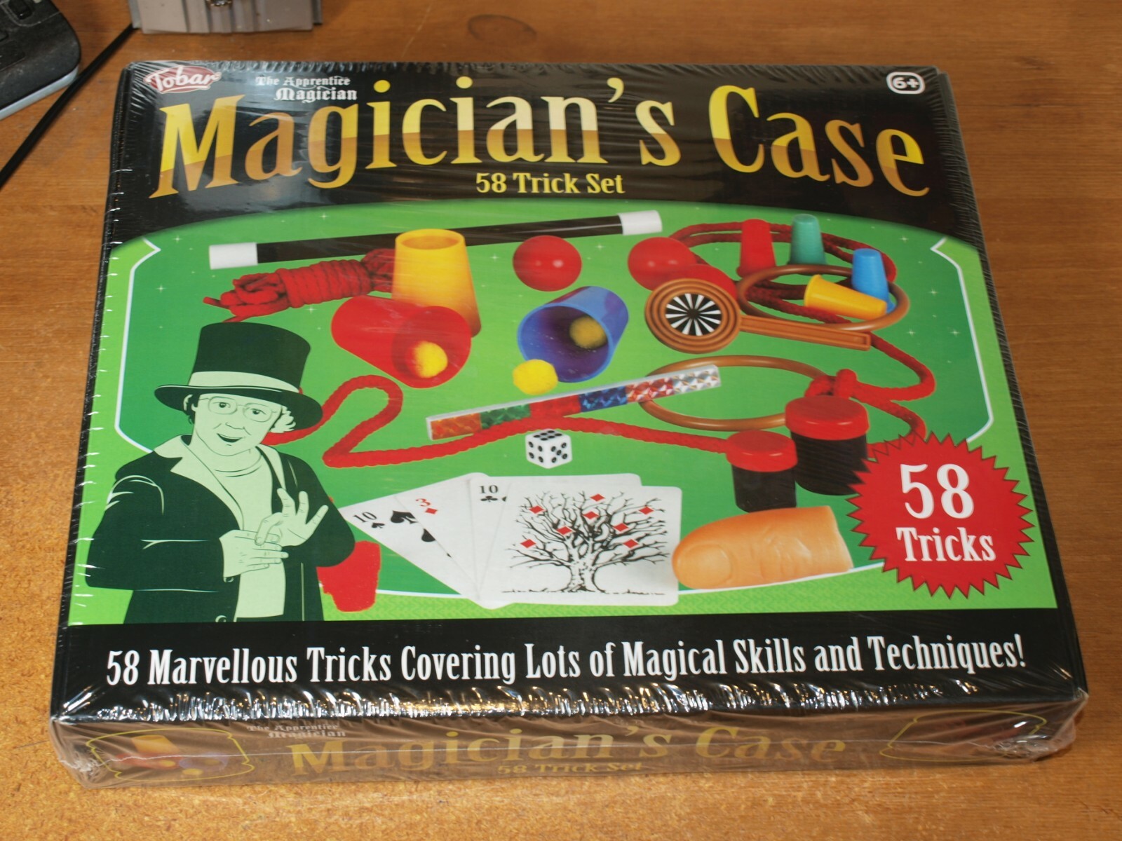 MAGICIAN'S CASE, 58 TRICK SET...COVERING LOTS OF MAGICAL SKILLS, NEW AND SEALED.