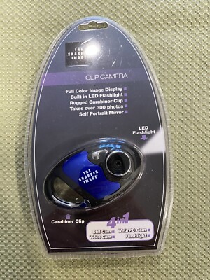 The SHARPER IMAGE CLIP CAMERA With LED FLASHLIGHT