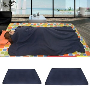 Get Ready To Fight Over The Rumpl Puffy Fleece Blanket In Camp