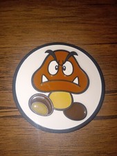 2011 SUPER MARIO BROTHERS GOOMBA BELT BUCKLE NINTENDO LICENSED NEW 