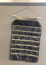 Debbie Reynolds Estate: Black And Gold Double-Sided Hanging Jewelry Holder￼￼