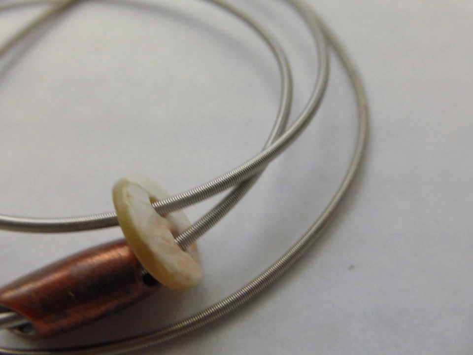 bracelet marque Reminiscence 3gr câble élastique, nacre et cuivre tbé - Photo 2/4