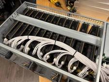 12x Nvidia CMP 100-210 16GB Mining GPUs In Octominer With Custom Power Cables