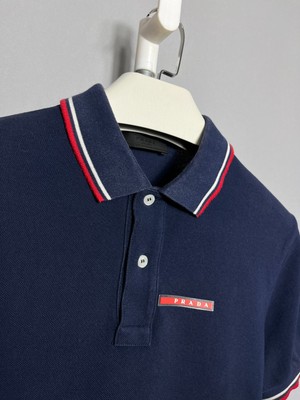 PRADA ネイビー ポロシャツ　S 魅力的な価格 PRADA - PRADA プラダ ポロシャツ S 紺 【古着
