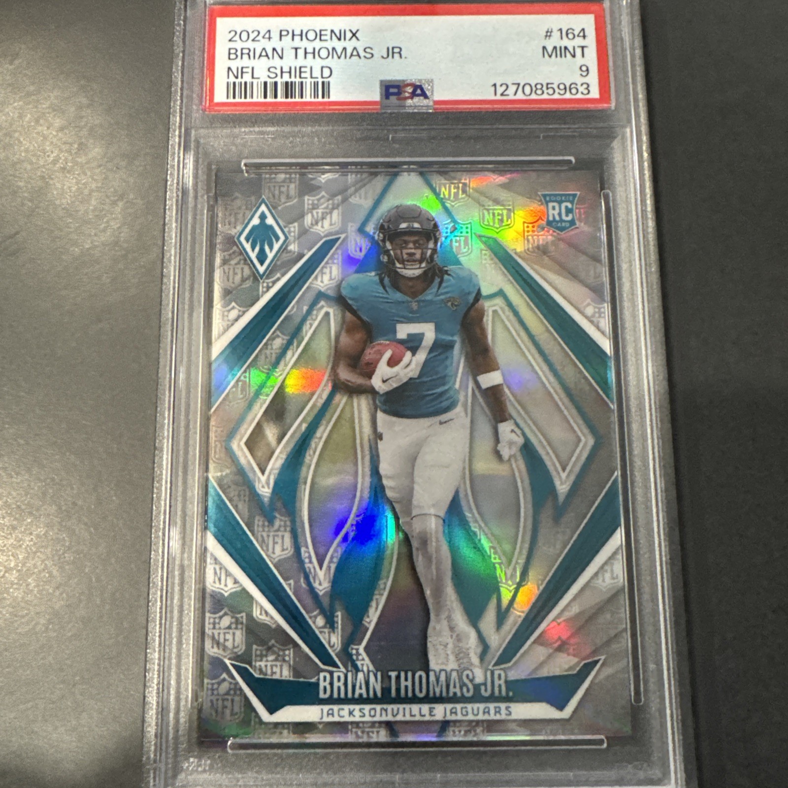 2024 Panini Phoenix Brian Thomas Jr. NFL Shield /150 #164 RC Jaguars PSA 9