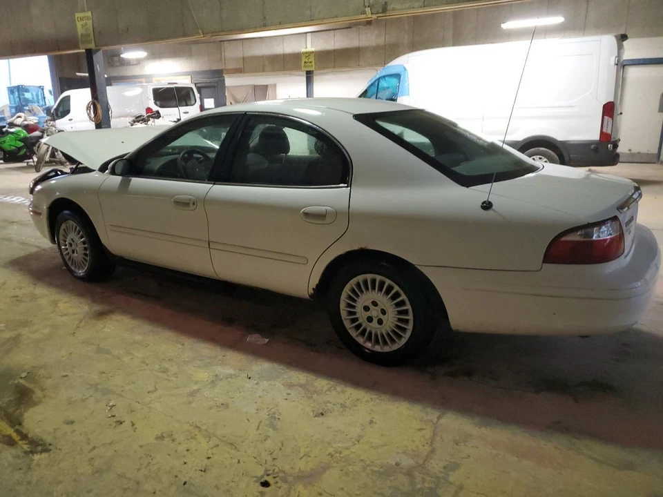 Espejo de puerta izquierdo usado se adapta a: Mercury Sable Power 2004 sin calefacción fija L. pintura a Foto 2 de 4