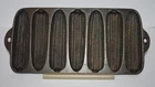 VINTAGE "KRUSTY KORN KOBS" by WAGNER WARE JUNIOR -CAST IRON CORNBREAD PAN 1920