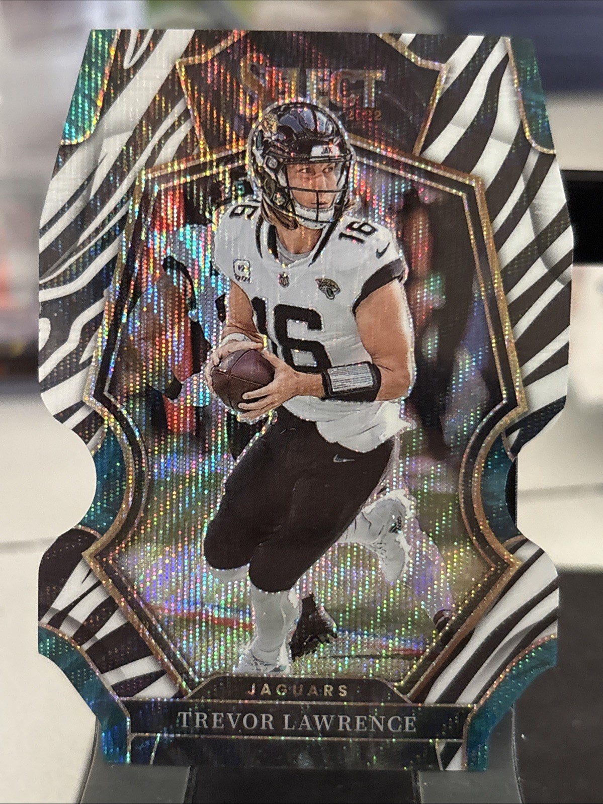 2022 Panini Select Trevor Lawrence Premier Level Zebra Die-Cut Prizm SSP #145