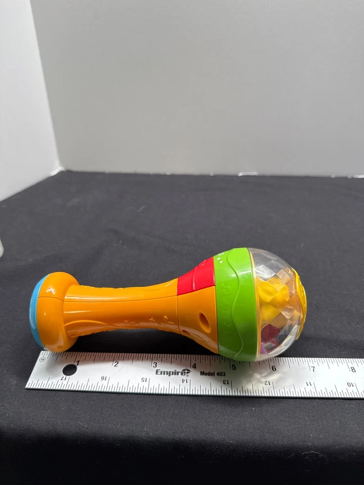 Juguete agitador de maraca amarilla arco iris musical LeapFrog para niños pequeños Foto 4 de 4