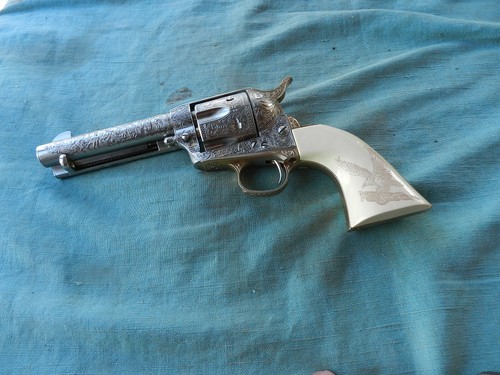 John Wayne Commemorative replica Colt Single Action by Franklin Mint.