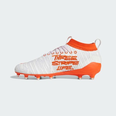 orange adidas football cleats
