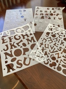 4 Sheets Of Alphabet And Number Stencils
