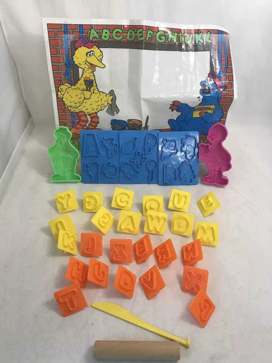 1992 Sesame Street ABC Company Play Doh mat molds Cookie Monster