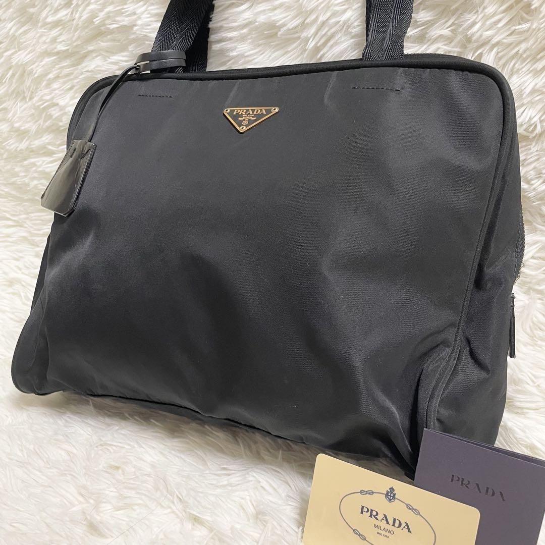 Prada nylon black handbag in excellent condition with white tag from Japan