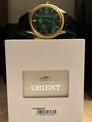 JDM ORIENT SAC08002F0,Men Bambino,Mechanical Movement,Gold Tone,Strap,Date,WR