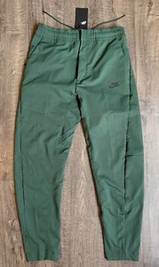 nike woven tech pants