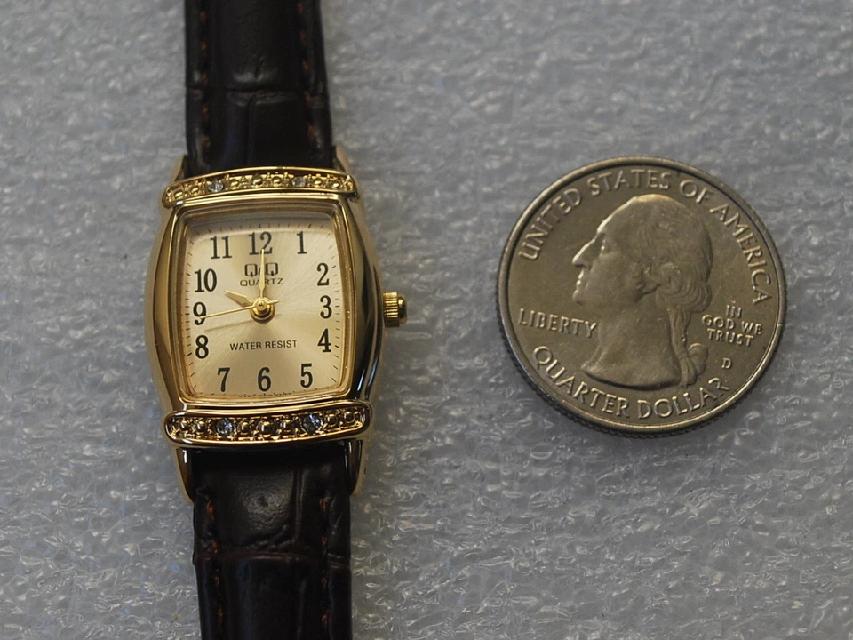 New Q&Q by Citizen Gold Tone Lady Watch w/Leather Band & Diamond Bezel - image 4 of 4