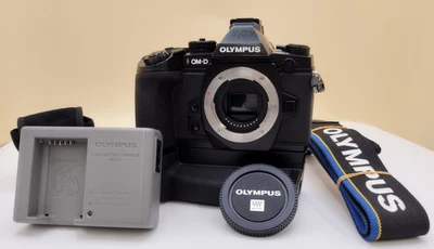 Olympus OM-D E-M1 noir 16,3 mégapixels comme neuf avec HLD-7 & SDC presque co... - Photo 1/4