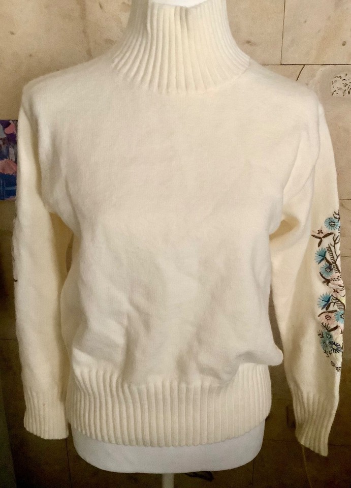 Knit Turtleneck Sweater With Floral Embroidered Sleeves