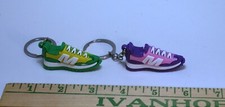 Lot of two sneaker / tennis shoe key chains great collectible set hard to find.