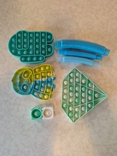 Pop It Fidget Sensory Toy Set Tubes Assorted Shapes Colors Ages 3-11