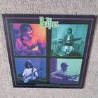 THE BEATLES . UNSURPASSED . NUMBERED 348/500 BLUE VINYL LP AND POSTER . SEALED