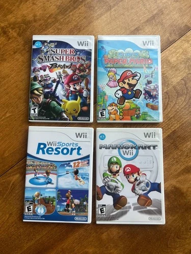 Assorted Nintendo Wii Video Game Lot Of 4 Mario kart,Paper Mario,Smash,Wii Sport